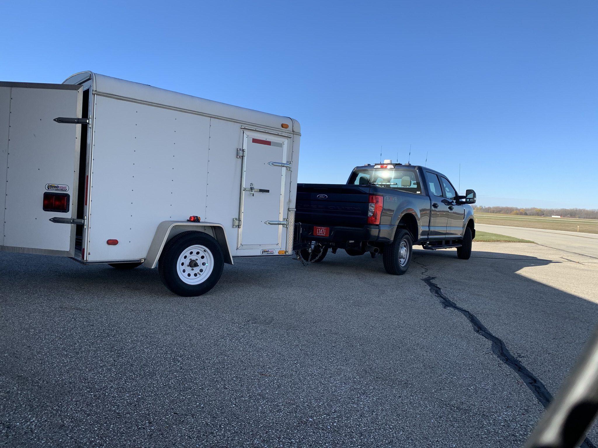A truck pulling communications gear in a trailer