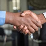 two people shaking hands