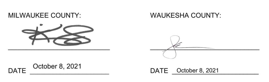 An example of a signature footer. Two date and by fields signed and dated by two different people.